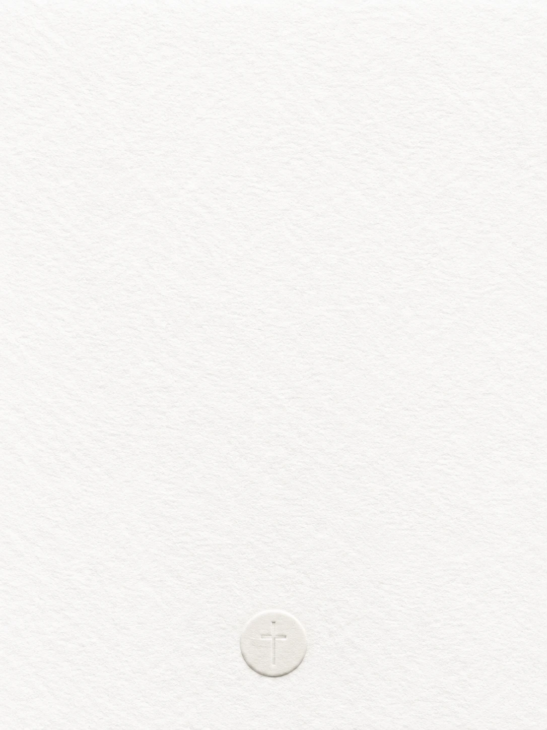 A small round communion host embossed with a plain cross.