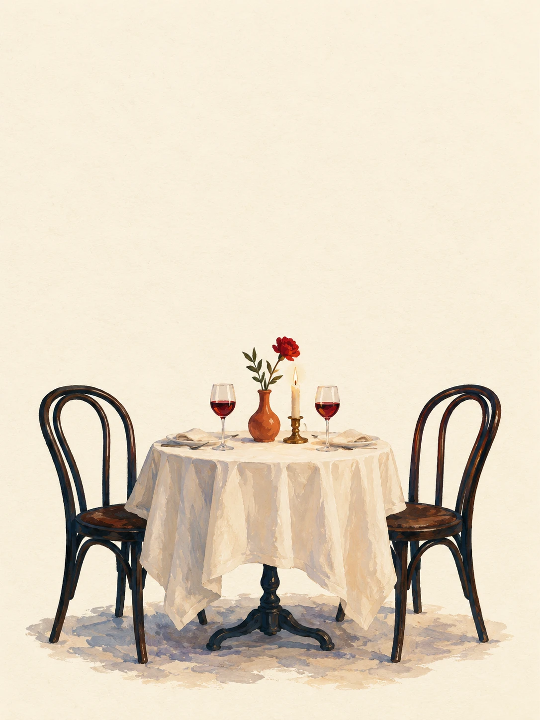 Two bentwood chairs flank a linen-covered bistro table set with wine glasses, a flower and a candle.