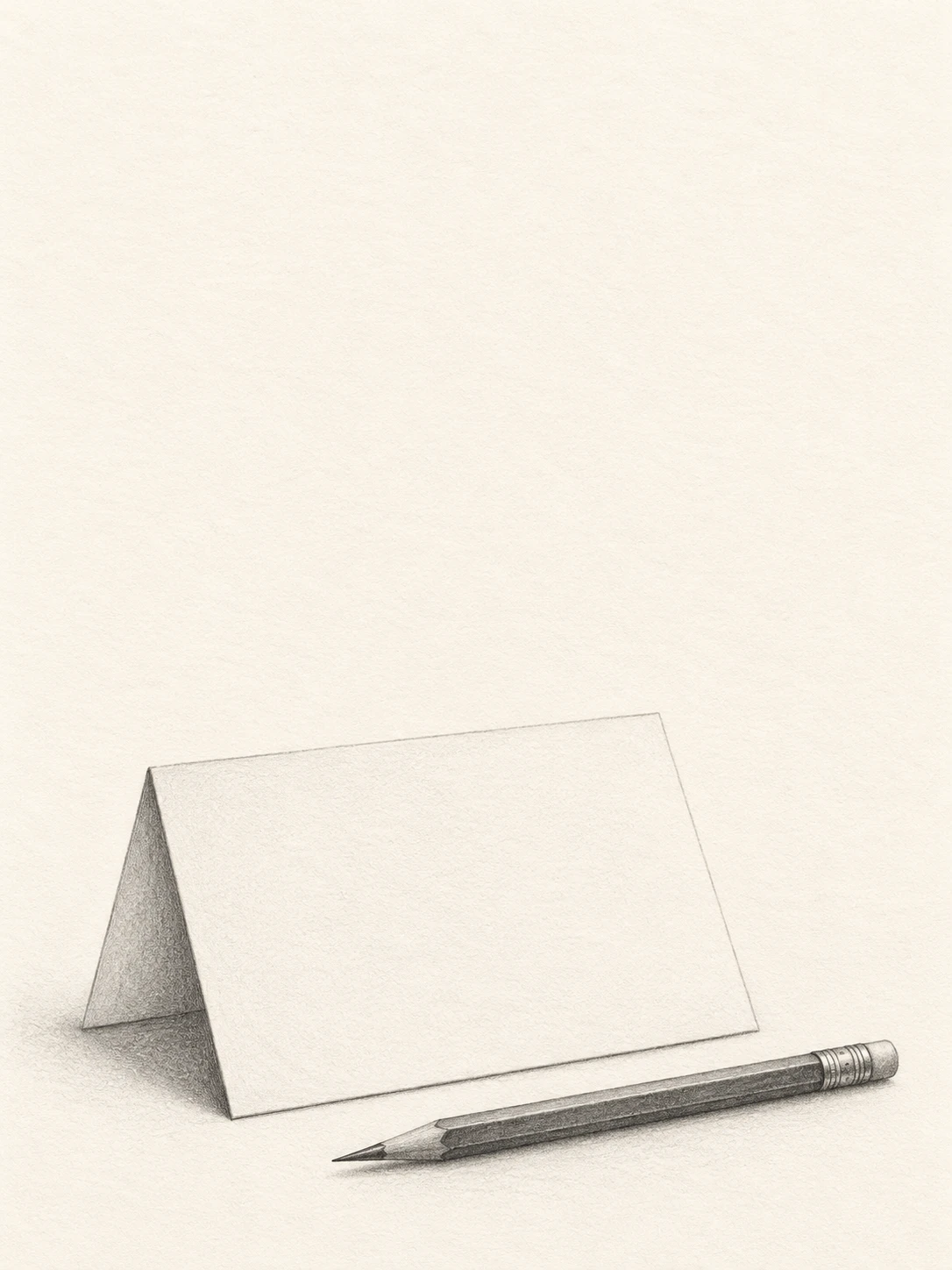 A blank folded note and sharpened pencil in a finished graphite drawing.