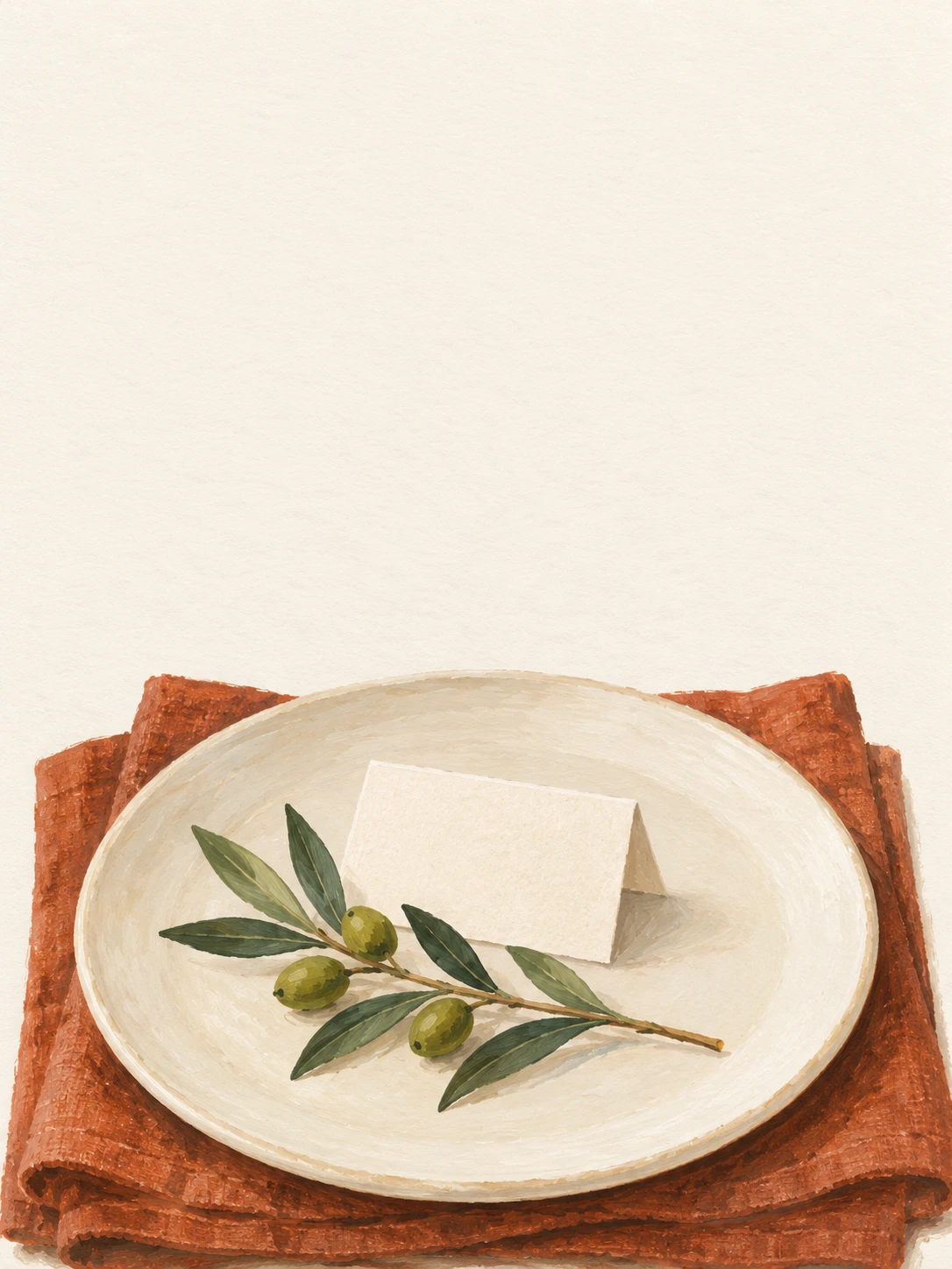 A cream dinner plate, olive sprig and blank place card rest on a rust-colored linen napkin.