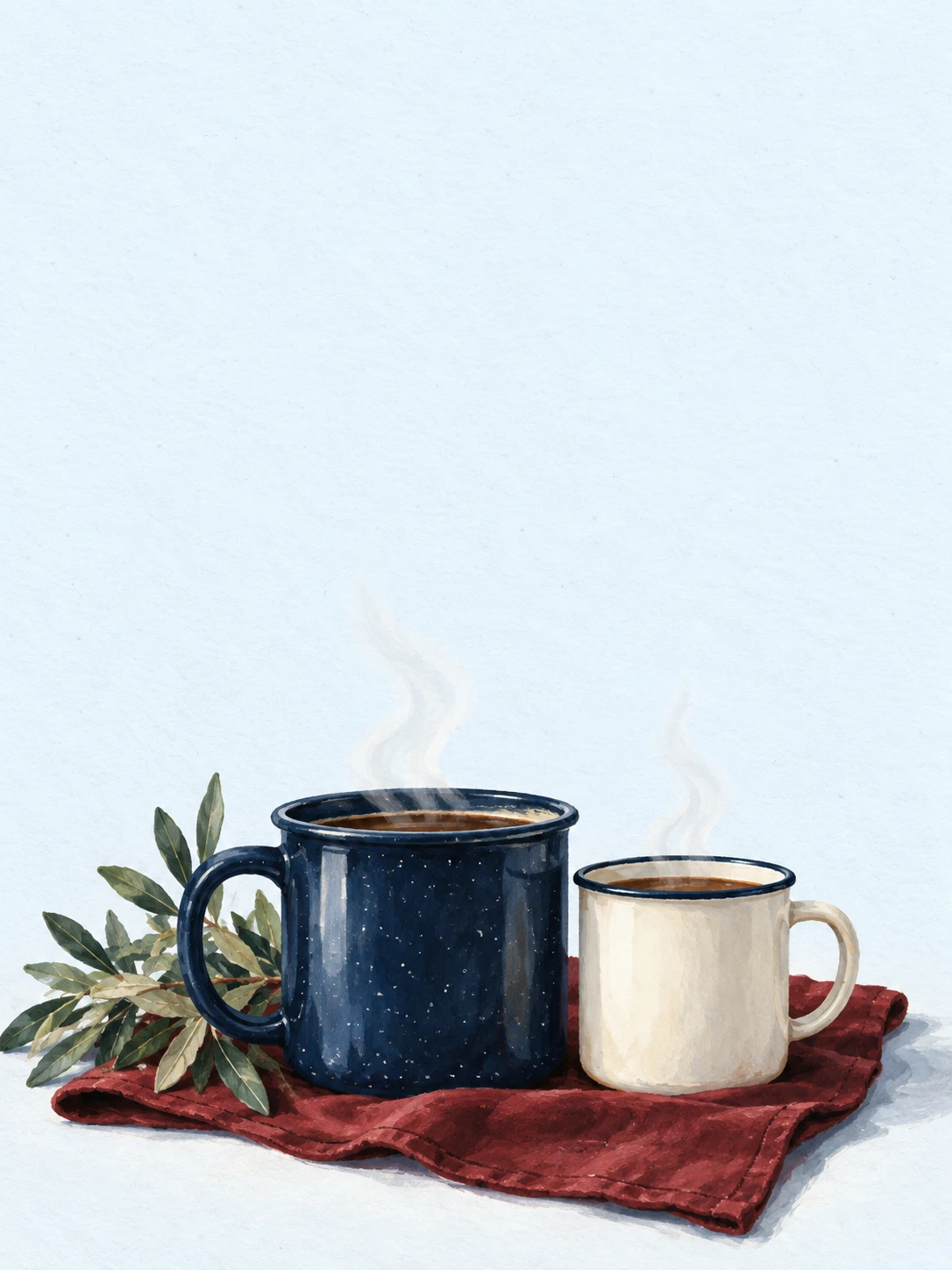 Navy and ivory enamel coffee mugs on a burgundy cloth with green leaves.